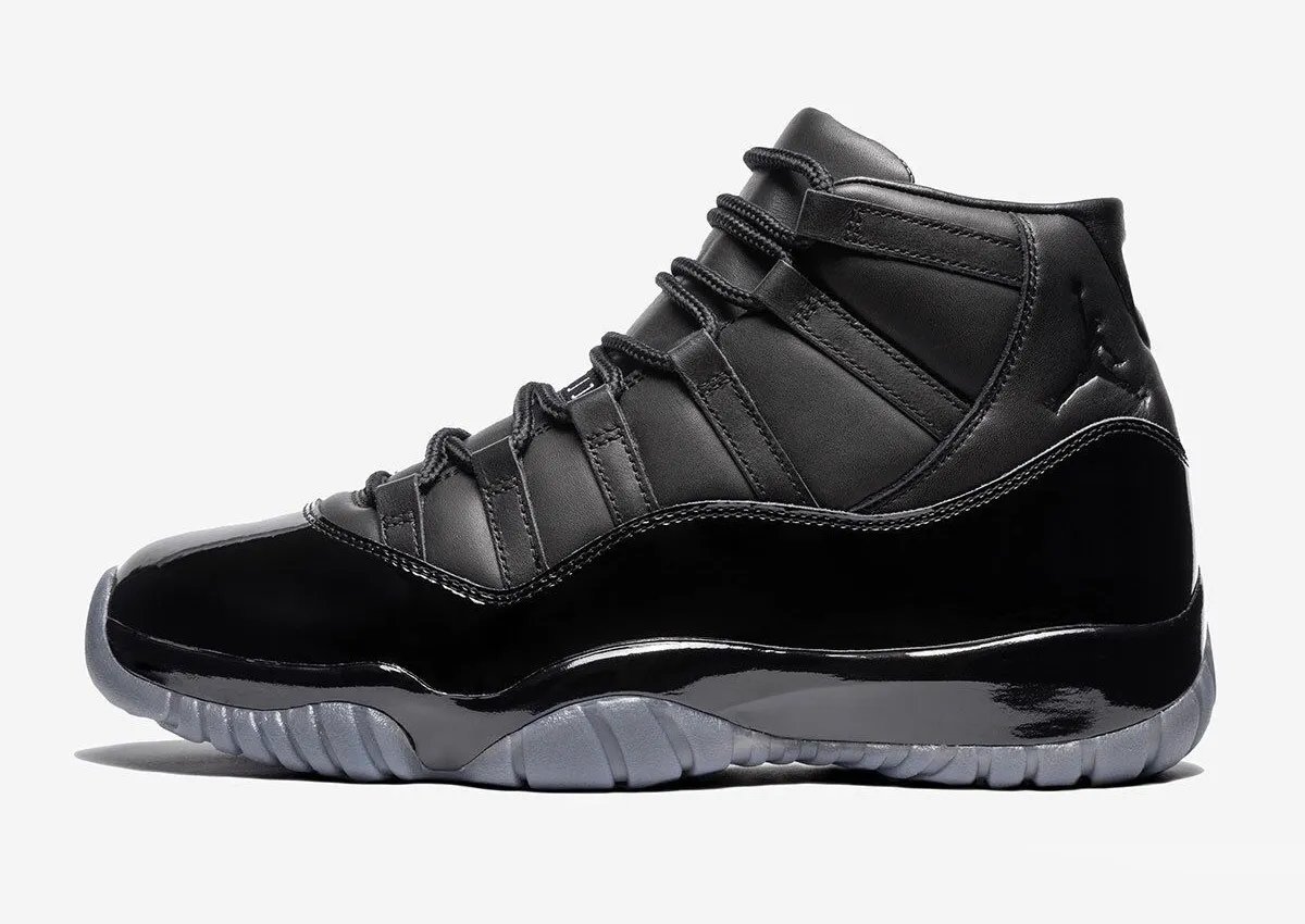 Comme des Garçons Homme Plus x Air Jordan 11 black and white colorways featuring premium cowhide leather and patent leather construction - detail view 4
