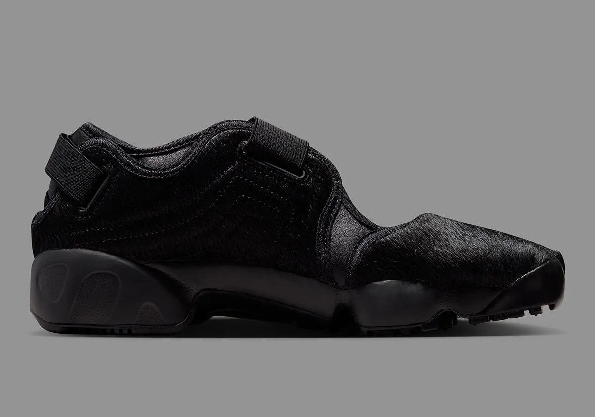 Nike Air Rift Pony Hair Pack in black colorway with tabi toe design and pony hair texture upper - detail view 3
