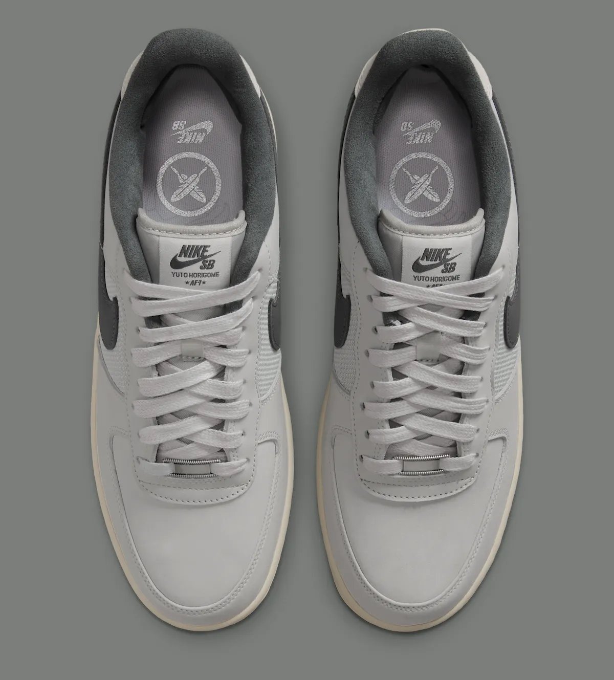 Yuto Horigome x Nike SB Air Force 1 Iron Grey featuring off-white leather upper with grey mesh panels and personalized heel branding - detail view 5
