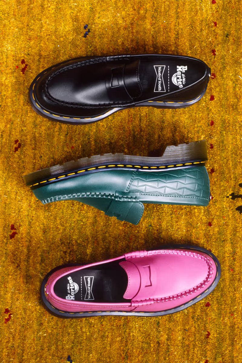 Dr. Martens x Wasted Youth Penton Loafer in black leather with embossed bowtie logo motif and yellow welt stitching - detail view 1