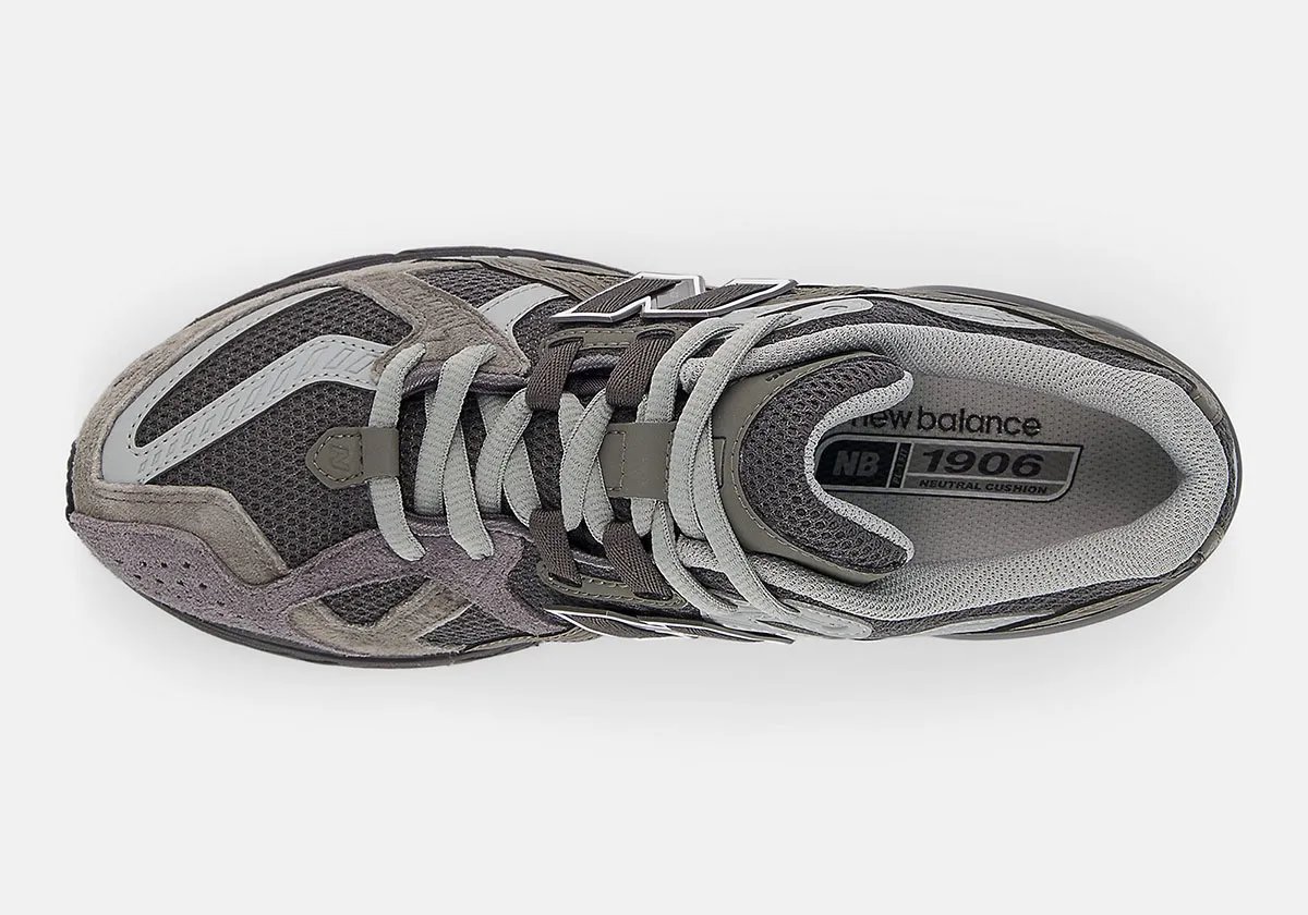 New Balance 1906U in Tornado Grey with layered grey tones and silver hardware accents - detail view 3
