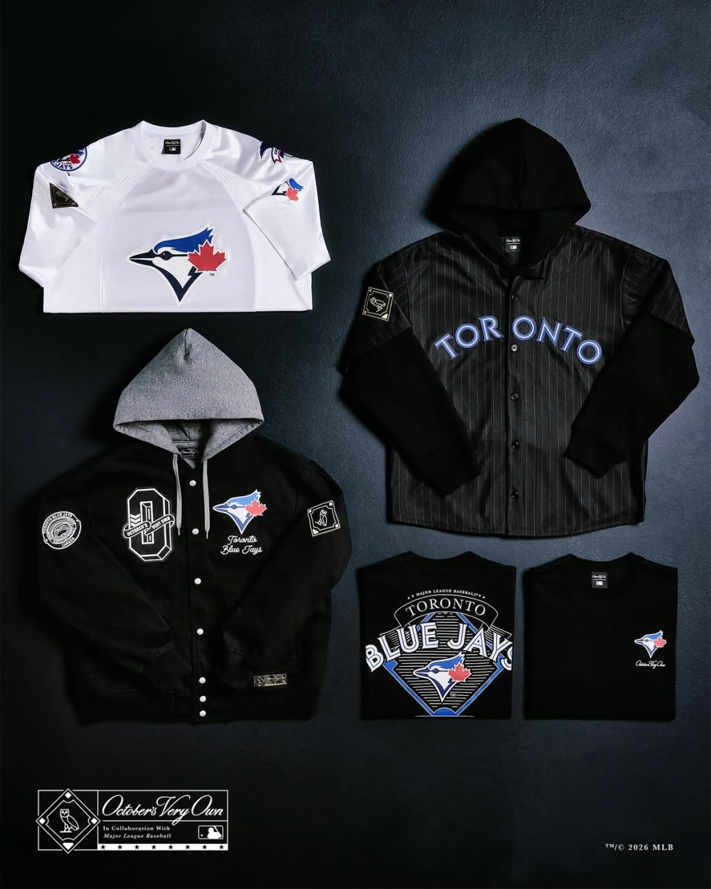 OVO x MLB collaboration collection product shot featuring October's Very Own and Major League Baseball branded pieces