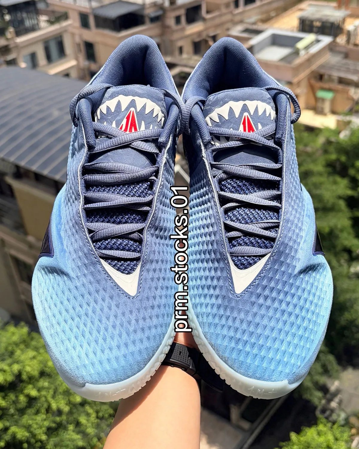 Nike Ja 4 "Jaws" in Diffused Blue, Blackened Blue, and University Red with shark teeth tongue detailing, inspired by classic film poster design - detail view 3