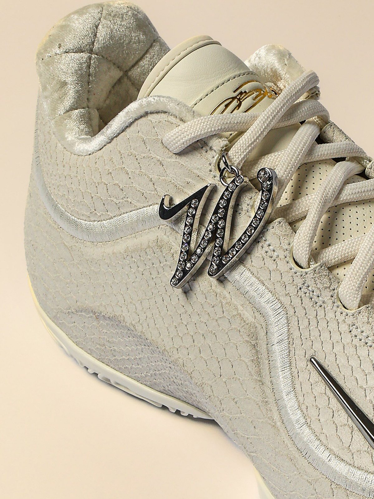 Nike LeBron 23 'White Label' in off-white leather with reptilian scale detailing and metallic Swoosh, WNBA All-Star 2026 collection - detail view 1