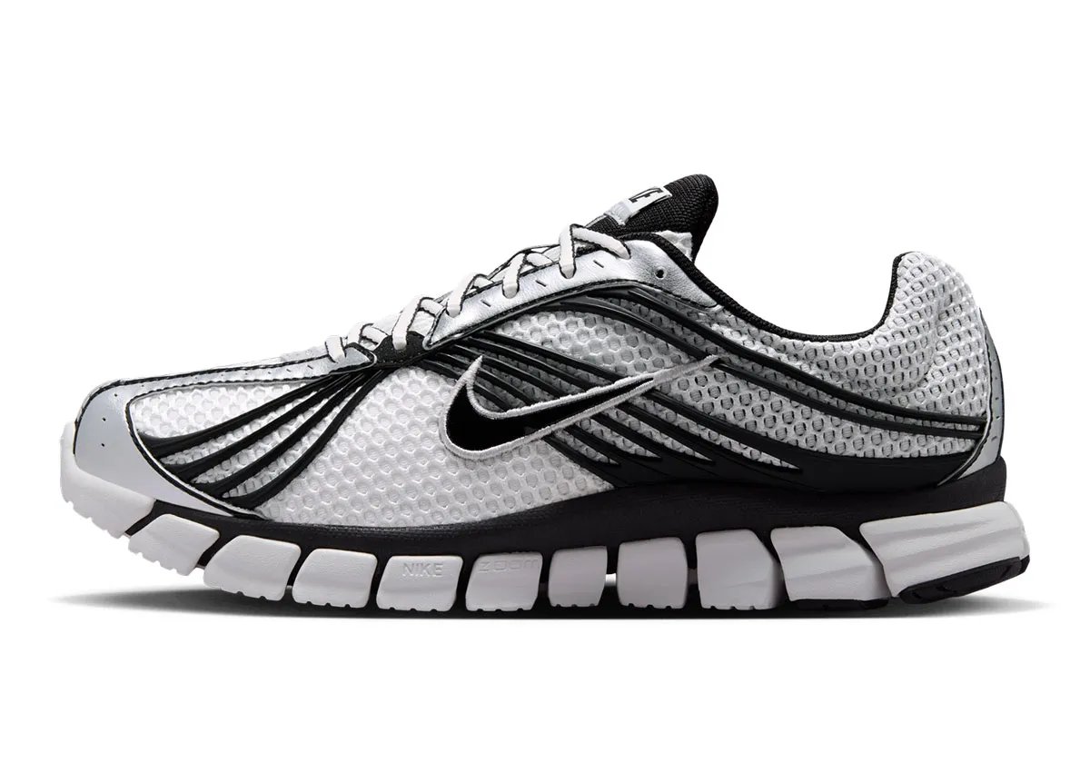 Nike Zoom Skylon 11 in black and white colorway showing wavy mesh upper and Lunarlon midsole - detail view 1