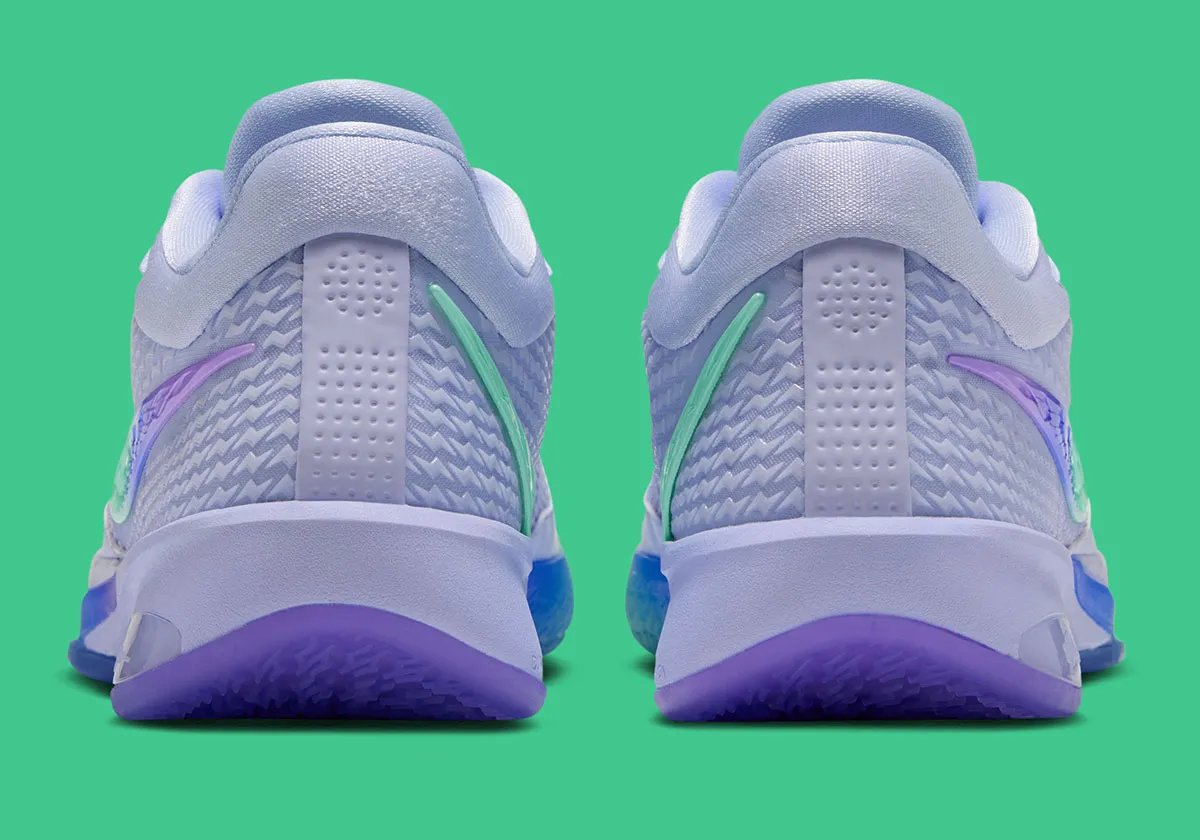 Nike Sabrina 4 Superstition colorway featuring pale purple upper with tri-tone gradient of Liberty green, royal blue, and metallic purple on the outsole and Swoosh - detail view 4