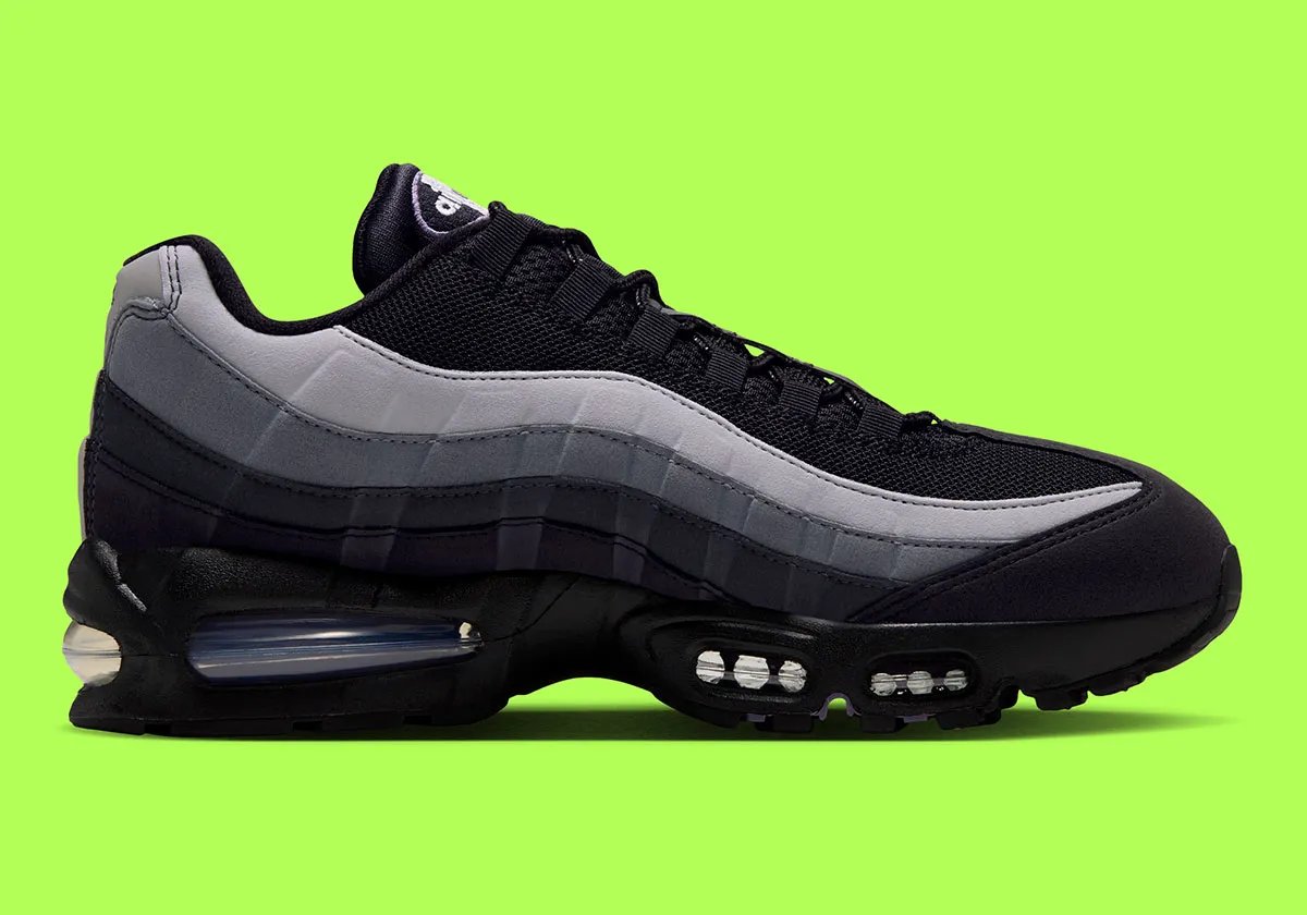 Nike Air Max 95 Joker colorway in Canyon Purple and villain green, featuring jewel-tone Swoosh and grey side panels - detail view 3