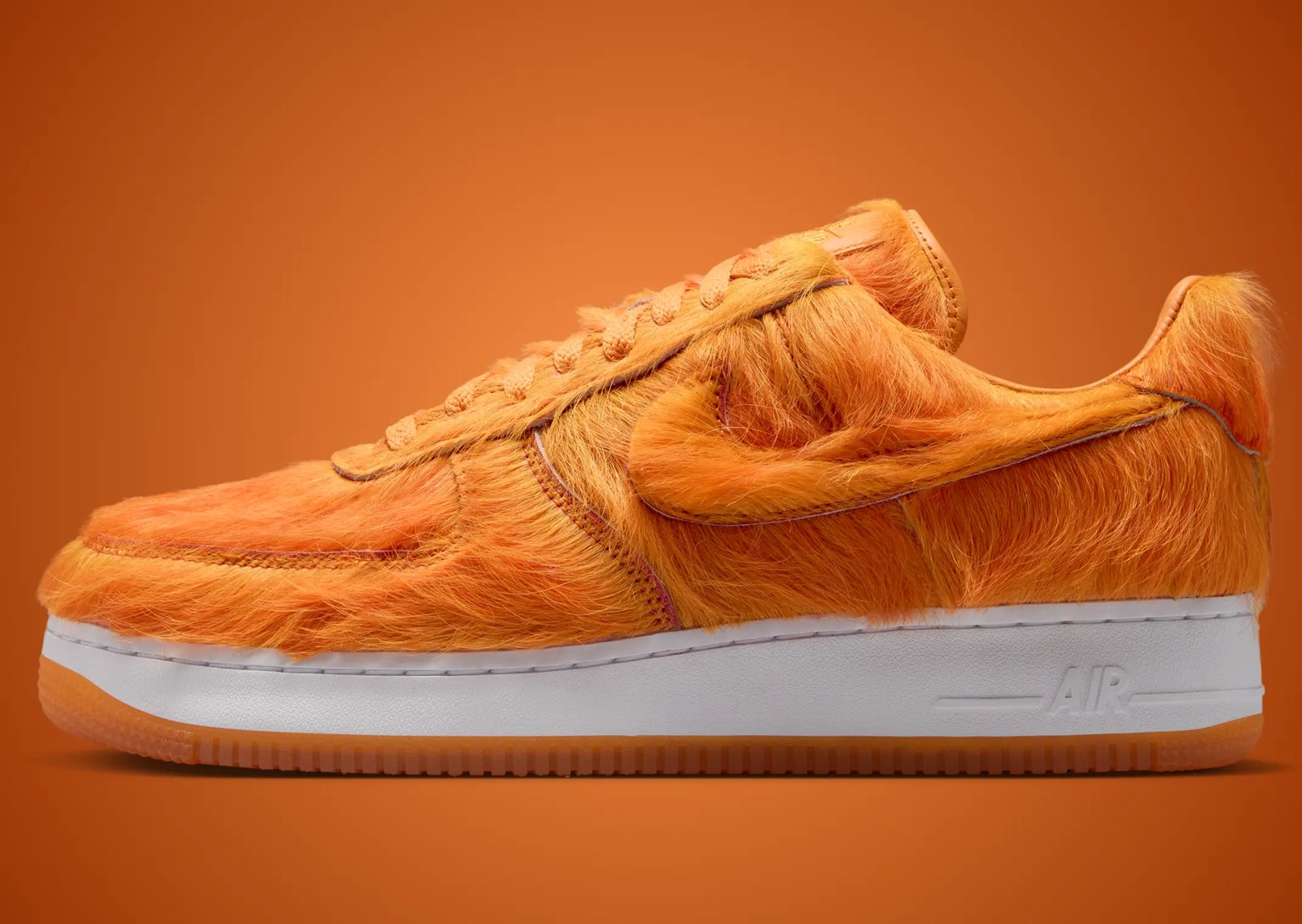 Nike Air Force 1 Low Technicolor Tale Orange Pony Hair with thick orange horsehair upper, white midsole, and orange outsole - detail view 3