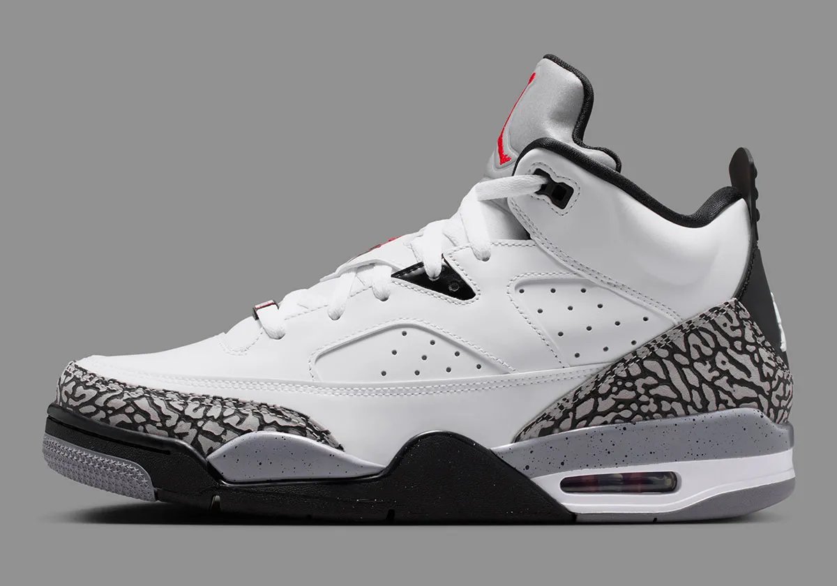 Jordan Son of Mars Low in White Cement colorway, showcasing white canvas upper with grey cement paneling and tonal midsole - detail view 2