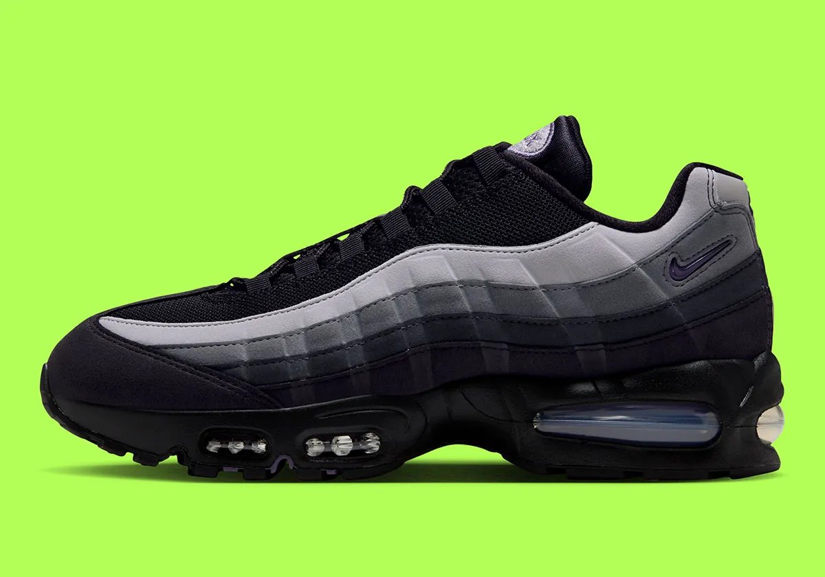 Nike Air Max 95 Joker colorway in Canyon Purple and villain green, featuring jewel-tone Swoosh and grey side panels - detail view 1