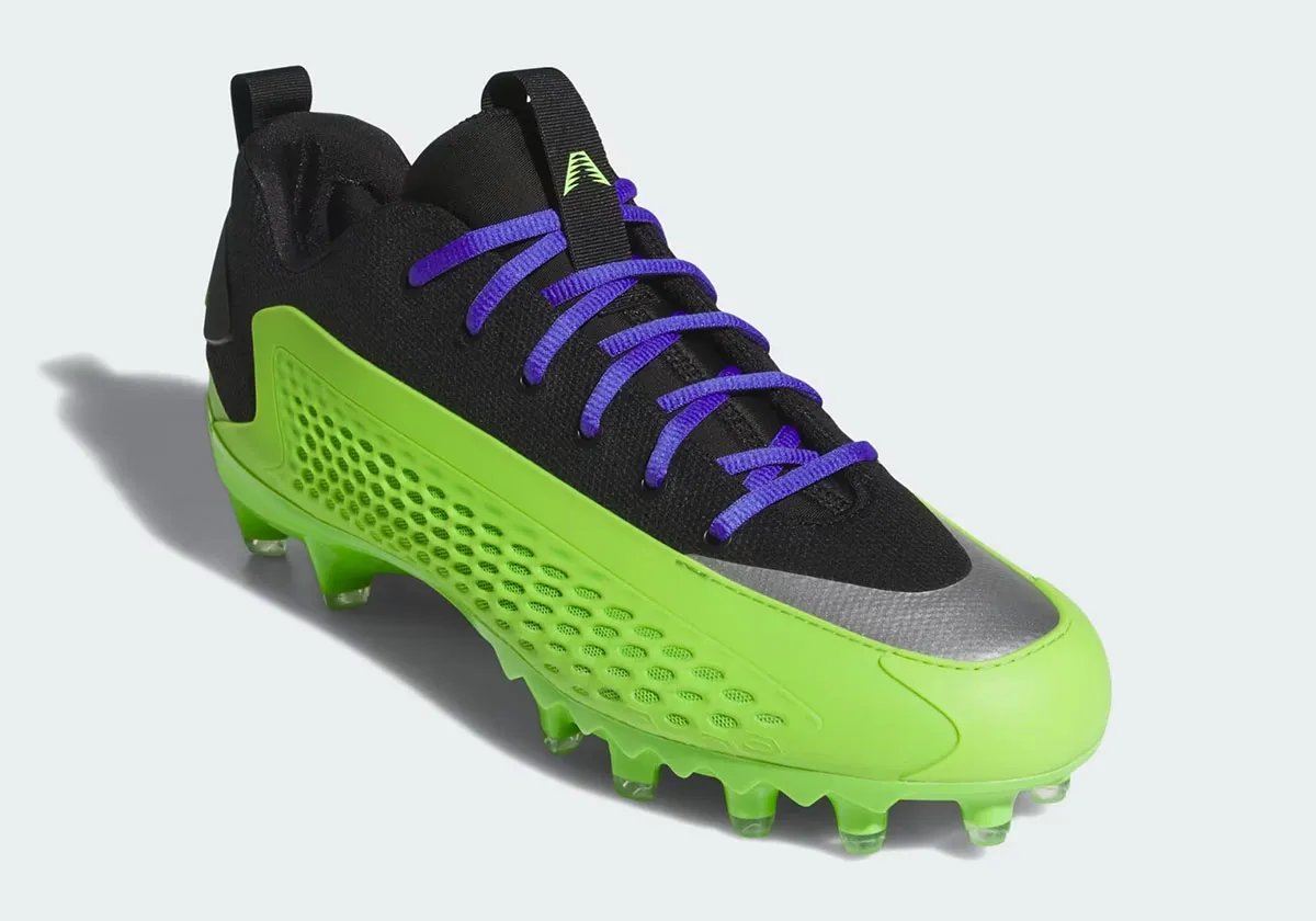 adidas Anthony Edwards 1 Low Cleat in black and Semi Solar Green Atlanta Vikings colorway - detail view 1