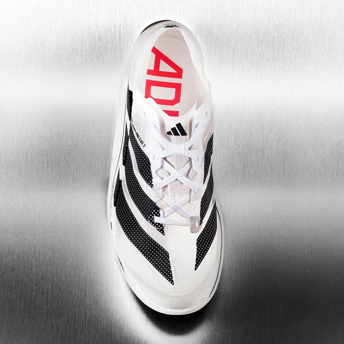 adidas Adizero Adios Pro EVO 3 running shoe in white and grey colorway, side profile view showing lightweight construction - detail view 2