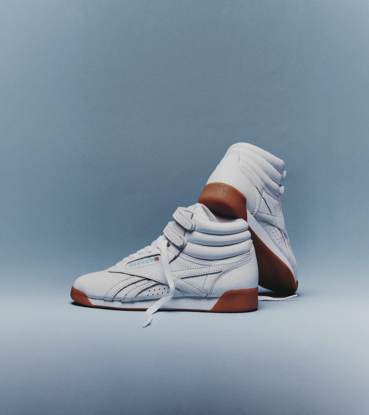 Karol G x Reebok Freestyle Hi 'Born Classic. Worn Together' in Footwear White, Blue, and Gum colorway - detail view 1