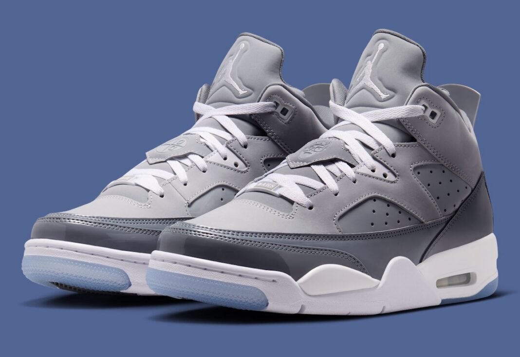 Jordan Son of Mars Low in Cool Grey, White, and Wolf Grey with patent leather mudguard and translucent outsole - detail view 1