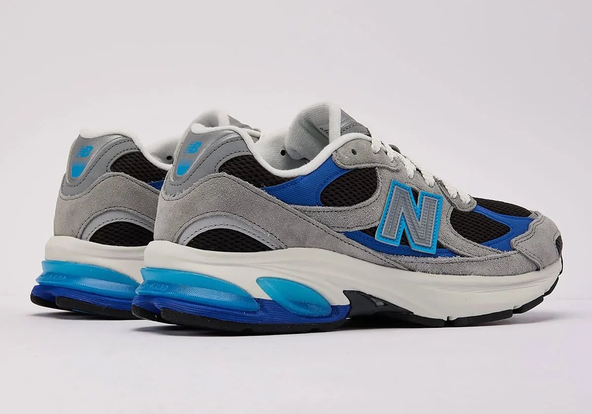 New Balance 2010 in grey suede and black mesh with royal blue and baby blue accents, retail colorway - detail view 1