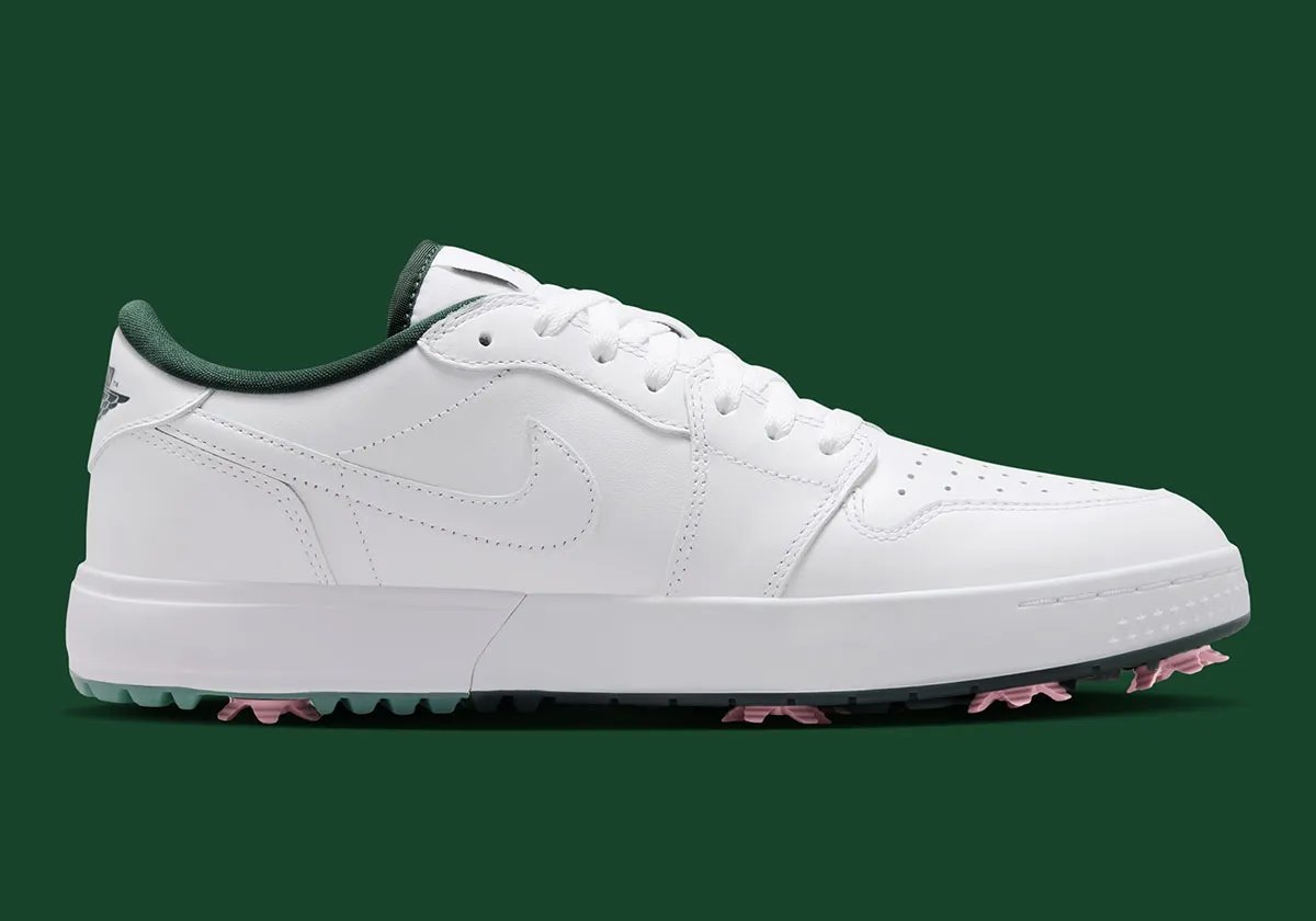 Air Jordan 1 Low Golf White/Fir featuring white leather upper, forest green lining, and pink spikes with redesigned golf sole - detail view 3