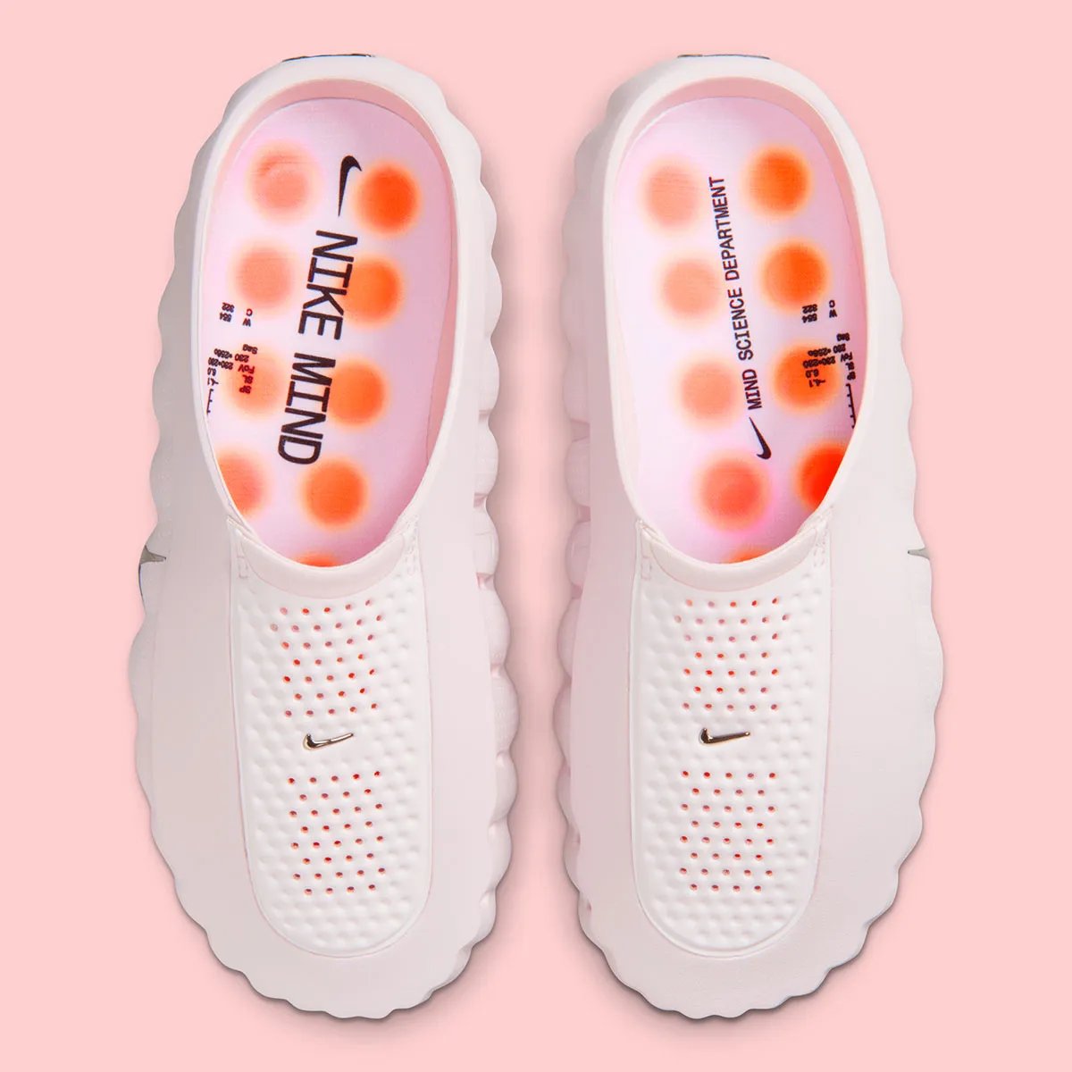Nike Mind 001 in Pearl Pink, a soft iridescent slide with molded footbed and refined strap design - detail view 3