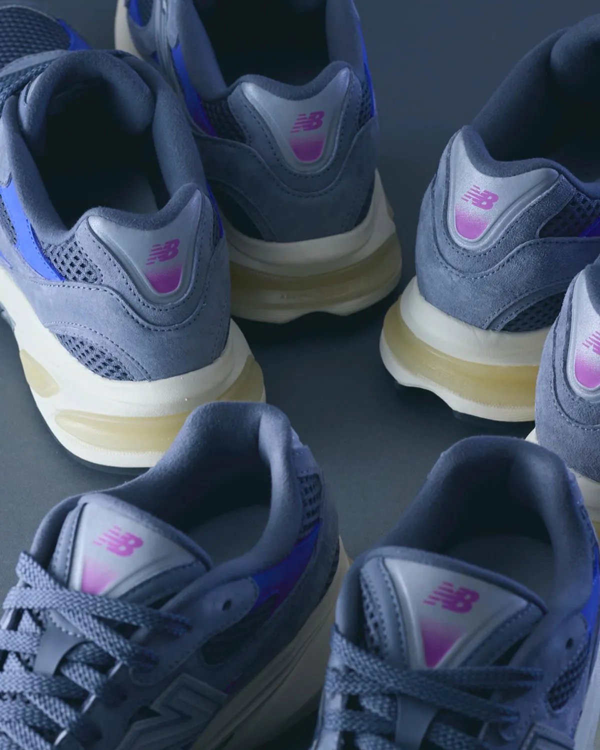 Liberaiders x UNIK x New Balance 2010 'Walk Together, Bonded by True Friendship' sneaker with grey mesh upper, blue underlays, and purple branding accents - detail view 2
