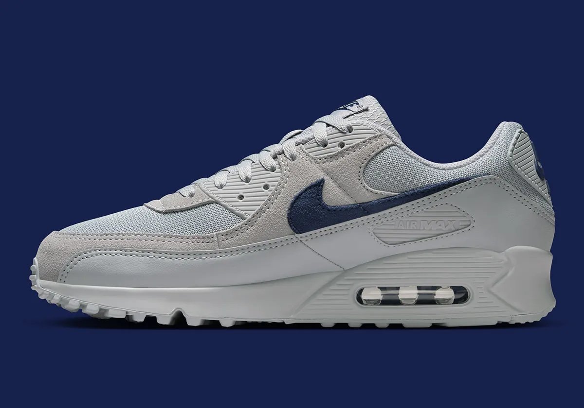Nike Air Max 90 in team-aligned colorway styled for stadium wear - detail view 1