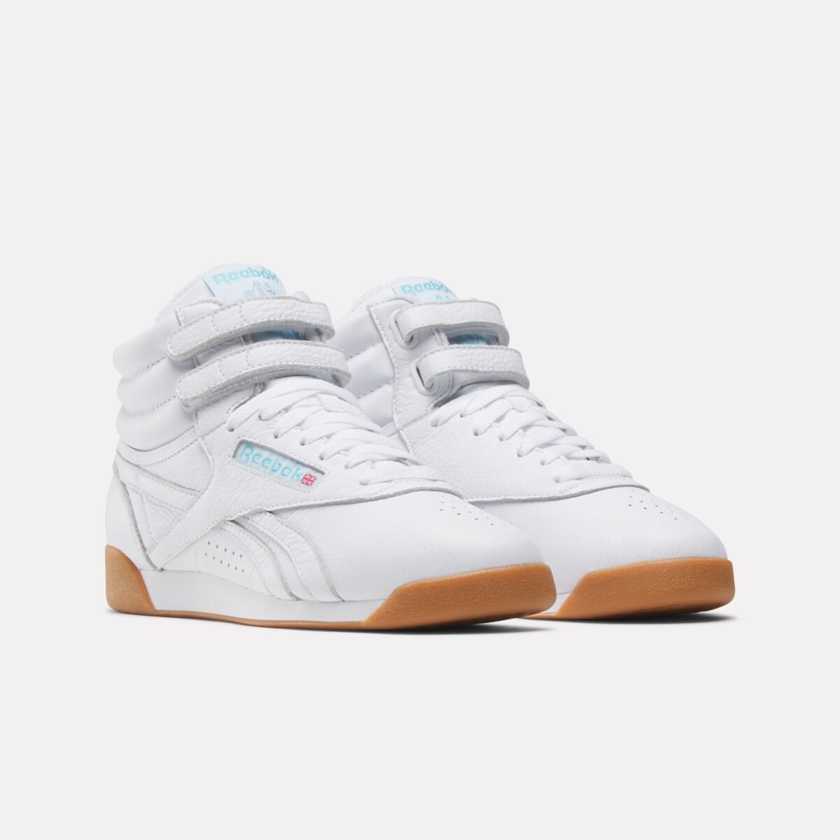 Karol G x Reebok Freestyle Hi 'Born Classic. Worn Together' in Footwear White, Blue, and Gum colorway - detail view 3