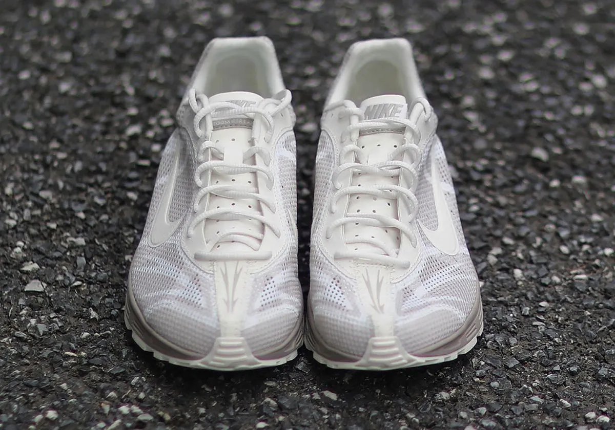 Nike Zoom Streak 3 in Cream II/Sail colorway, showing the flush upper construction and neutral palette of the 2009 performance runner returning as a lifestyle model - detail view 1