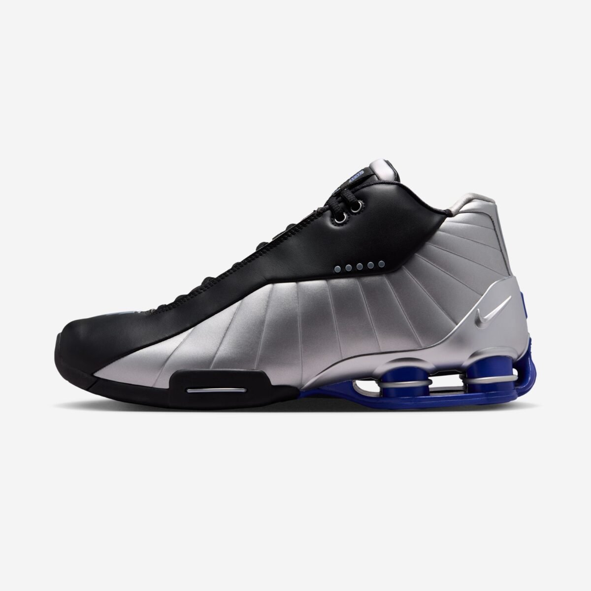 Nike Shox BB4 in Black and Metallic Silver colorway, showcasing the classic Shox cushioning platform and court-ready silhouette - detail view 2