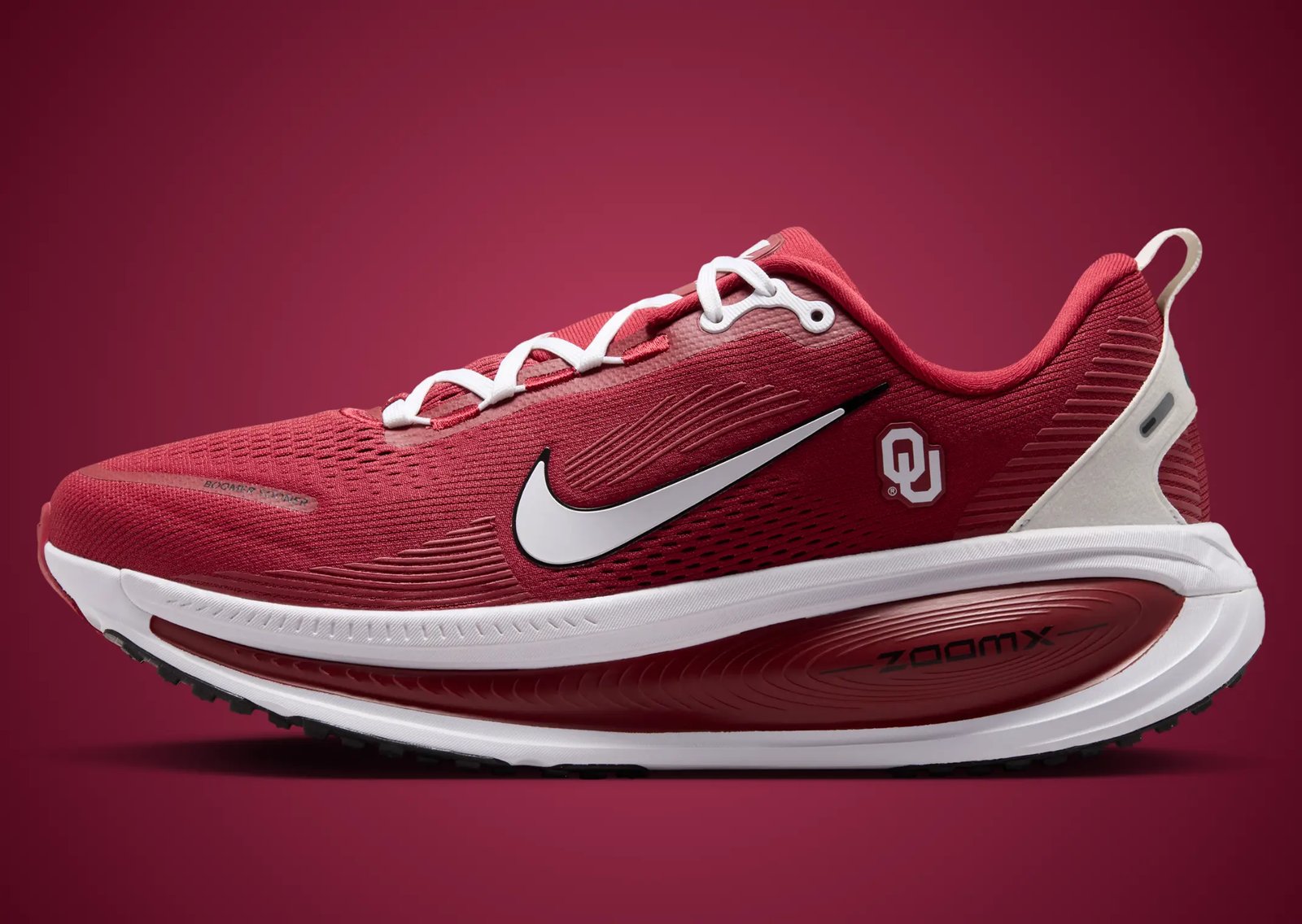 Nike Vomero 18 NCAA Pack featuring multiple school colorways with institutional logos positioned beneath the lateral Swoosh panel - detail view 4