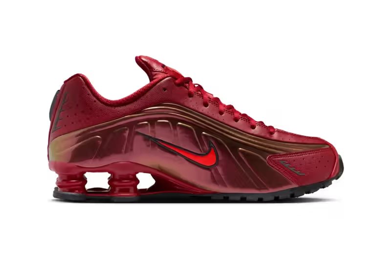 Nike Shox R4 in Team Crimson and Black colorway, side view showing column spring technology and Iron Man-inspired aesthetic - detail view 4
