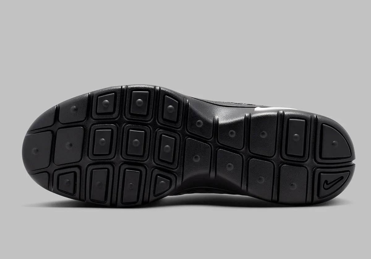 Nike Air Rejuven8 Camo Pack in Black/White and Barkroot Brown colorways with semi-opaque material and diamond camo pattern - detail view 3