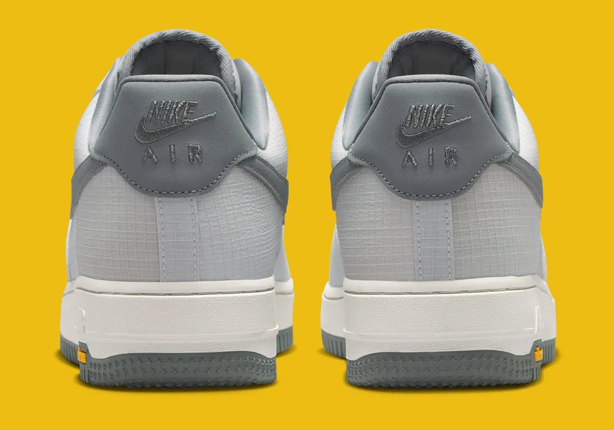 Nike Air Force 1 featuring Vibram outsole technology in neutral colorway, detail shot showing grip-focused rubber sole pattern - detail view 4