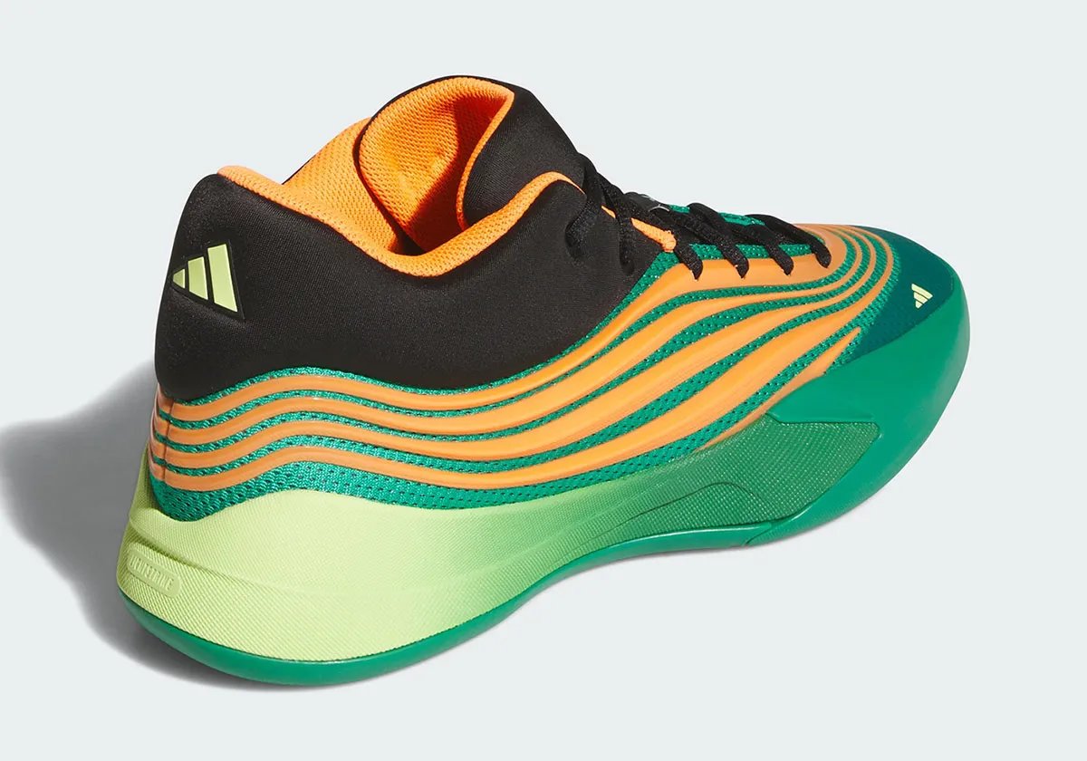 adidas Dame X "Meet the Moment" in black synthetic with orange trim and viridescent gradient sole, worn by Damian Lillard - detail view 3