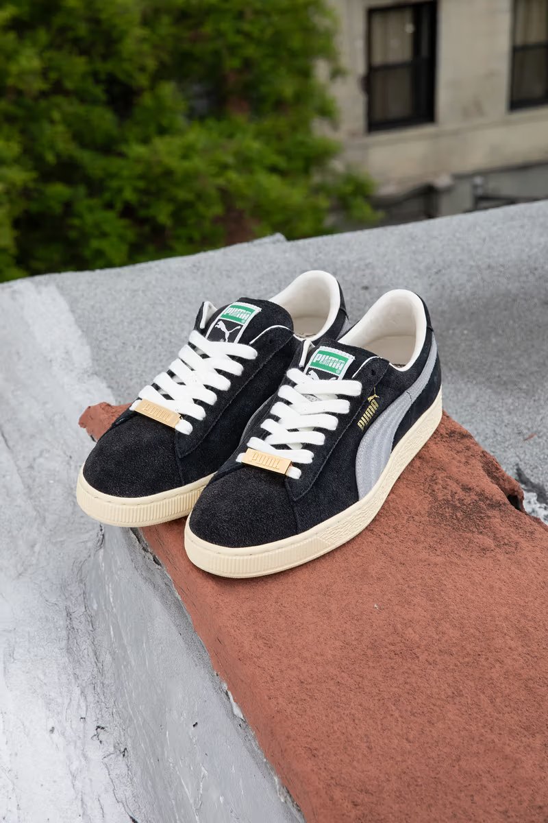 A$AP Rocky x PUMA Suede '94 in black with gold lace keeper and retro quarter-panel logo, July 2026 release - detail view 4