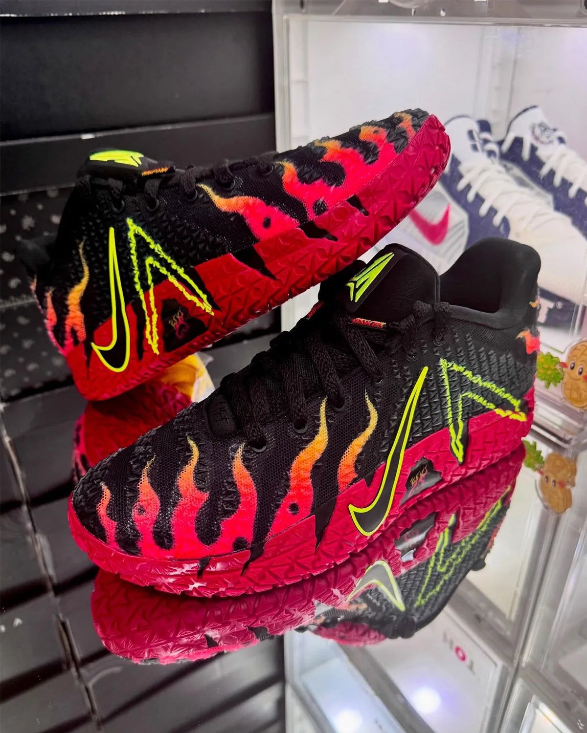 Nike Ja 3 WNBA player exclusive in bold colorway, side profile view showing extended collar and geometric sole structure - detail view 1