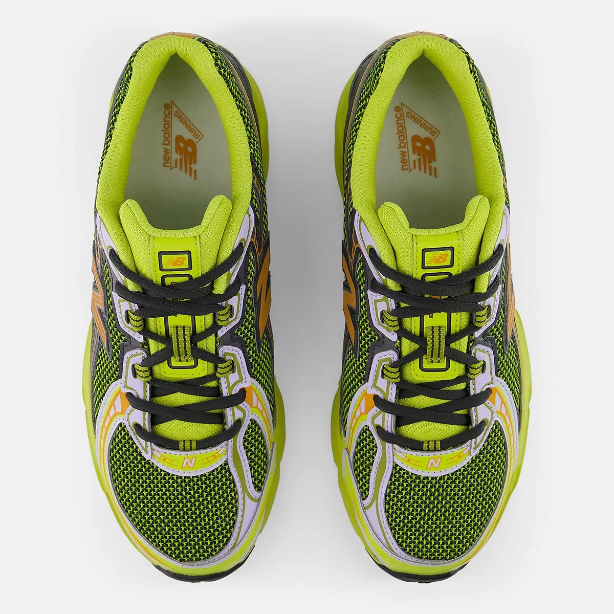 New Balance 740 in pea green and rust orange colorway with black netting and grey leather overlays, releasing Fall 2026 - detail view 3