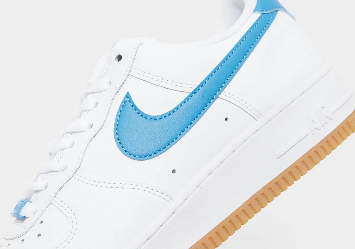 Nike Air Force 1 Low Aurora Blue with white leather upper, blue accents, and gum rubber sole - detail view 3