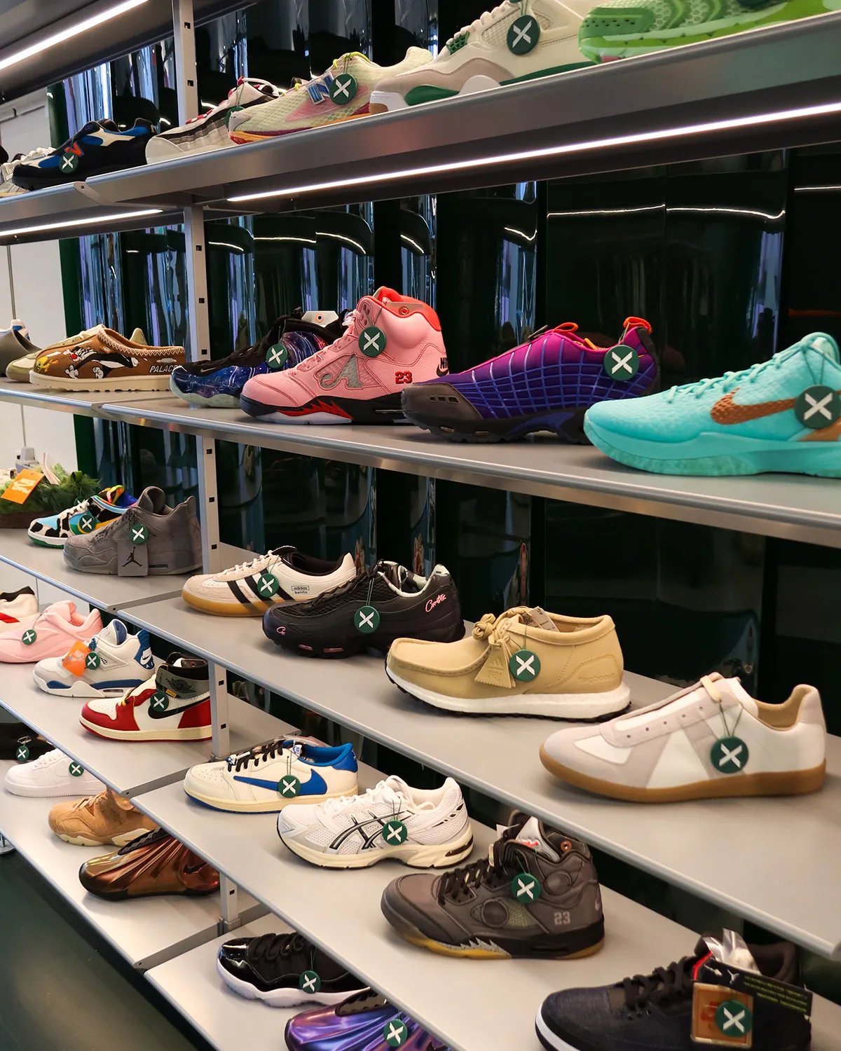 Interior view of StockX's renovated NYC flagship store in SoHo, displaying sneaker inventory and retail display fixtures - detail view 3