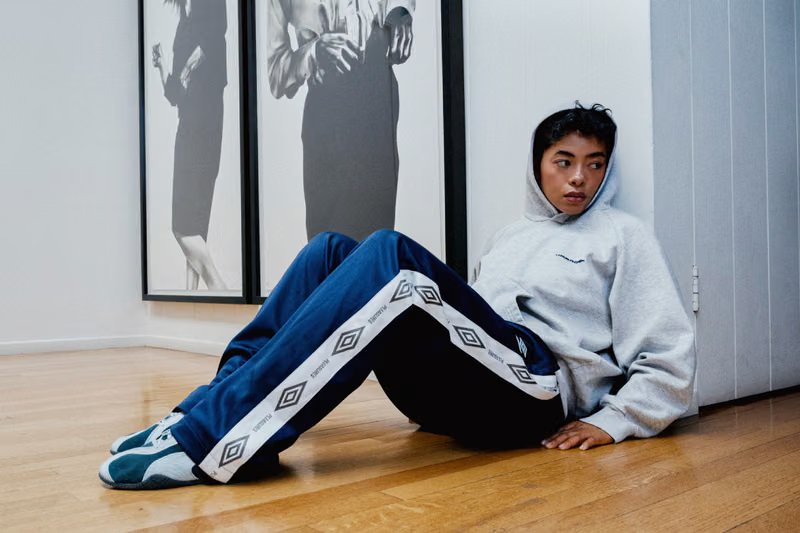 PLEASURES x Umbro capsule collection featuring oversized football shirts and track jackets inspired by 1990s British terrace and music culture - detail view 4