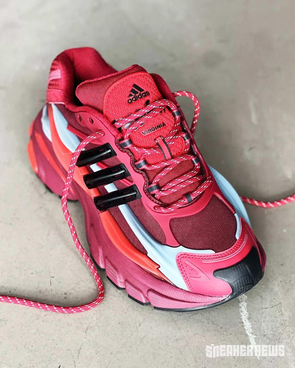 Pharrell's adidas VIRGINIA Jellyfish in red colorway with grey tentacle accents and black Three Stripes - detail view 2