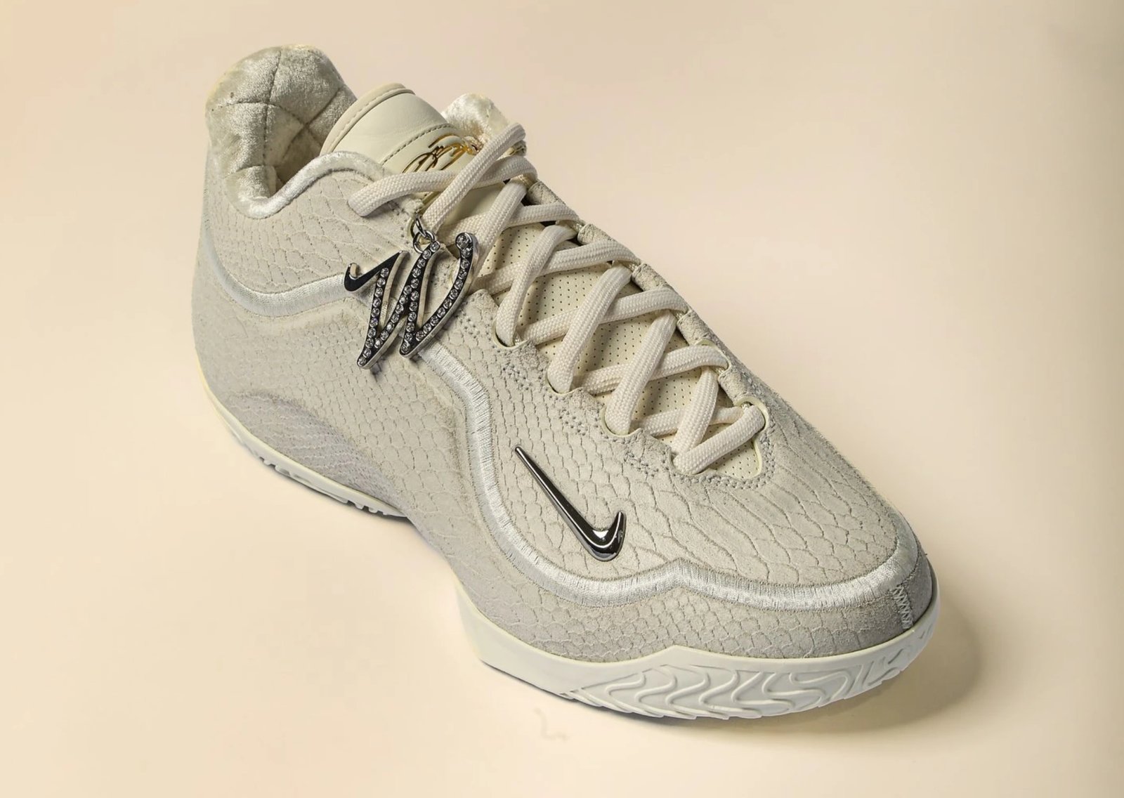 Nike LeBron 23 White Label PE with faux snakeskin upper, cream textile bands, and metallic silver accents - detail view 1