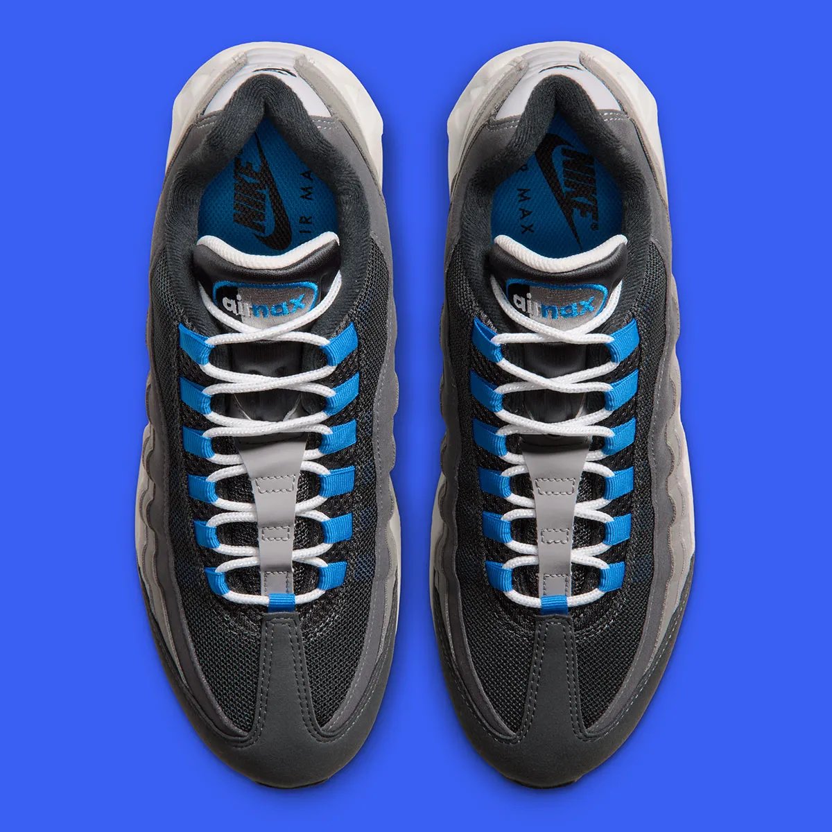 Nike Air Max 95 "Reverse Blue Spark" featuring inverted colorway with Blue Spark accents on Swoosh, tongue, and Big Bubble Air unit, white midsole, and black tongue - detail view 4