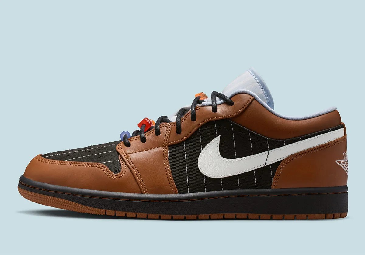 Air Jordan 1 Low in Black and Light British Tan pinstripe textile with brown leather overlays and textured laces - detail view 1