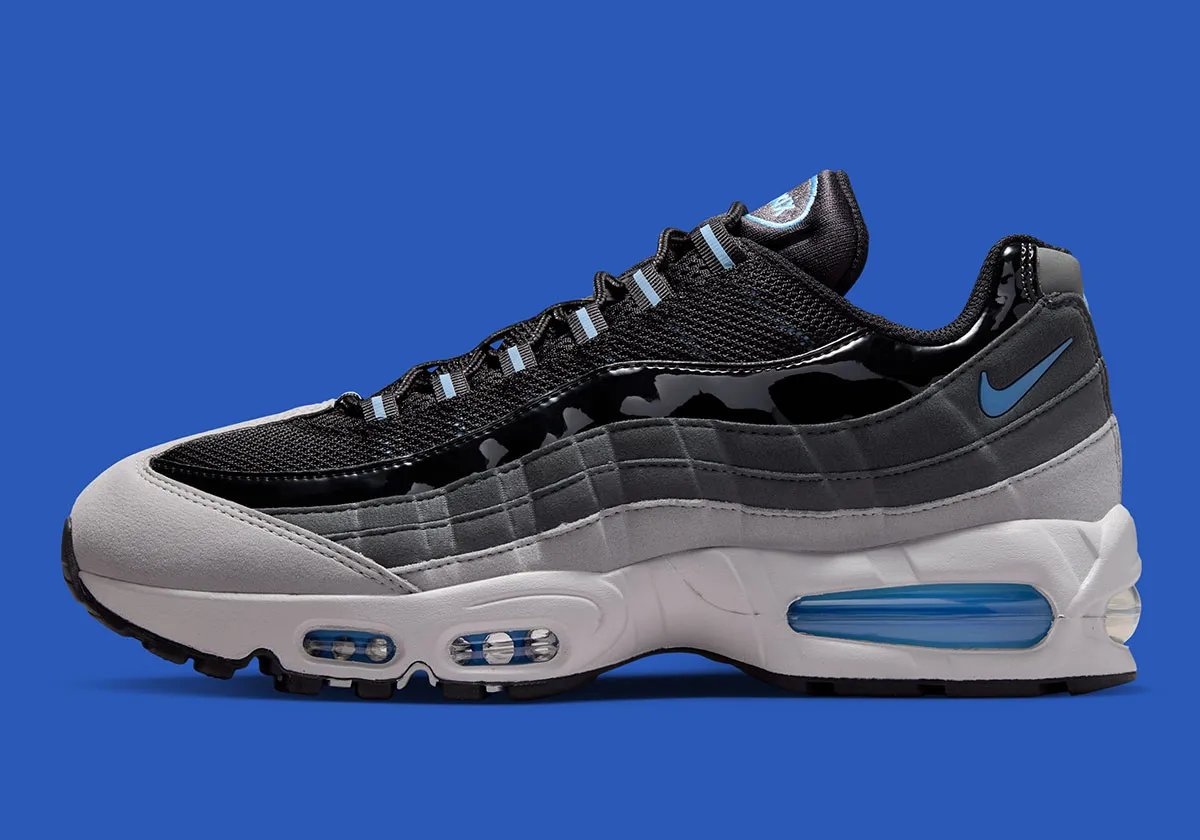 Nike Air Max 95 in Black with grey suede panels and Football Blue Swoosh, showing patent leather side paneling detail - detail view 1