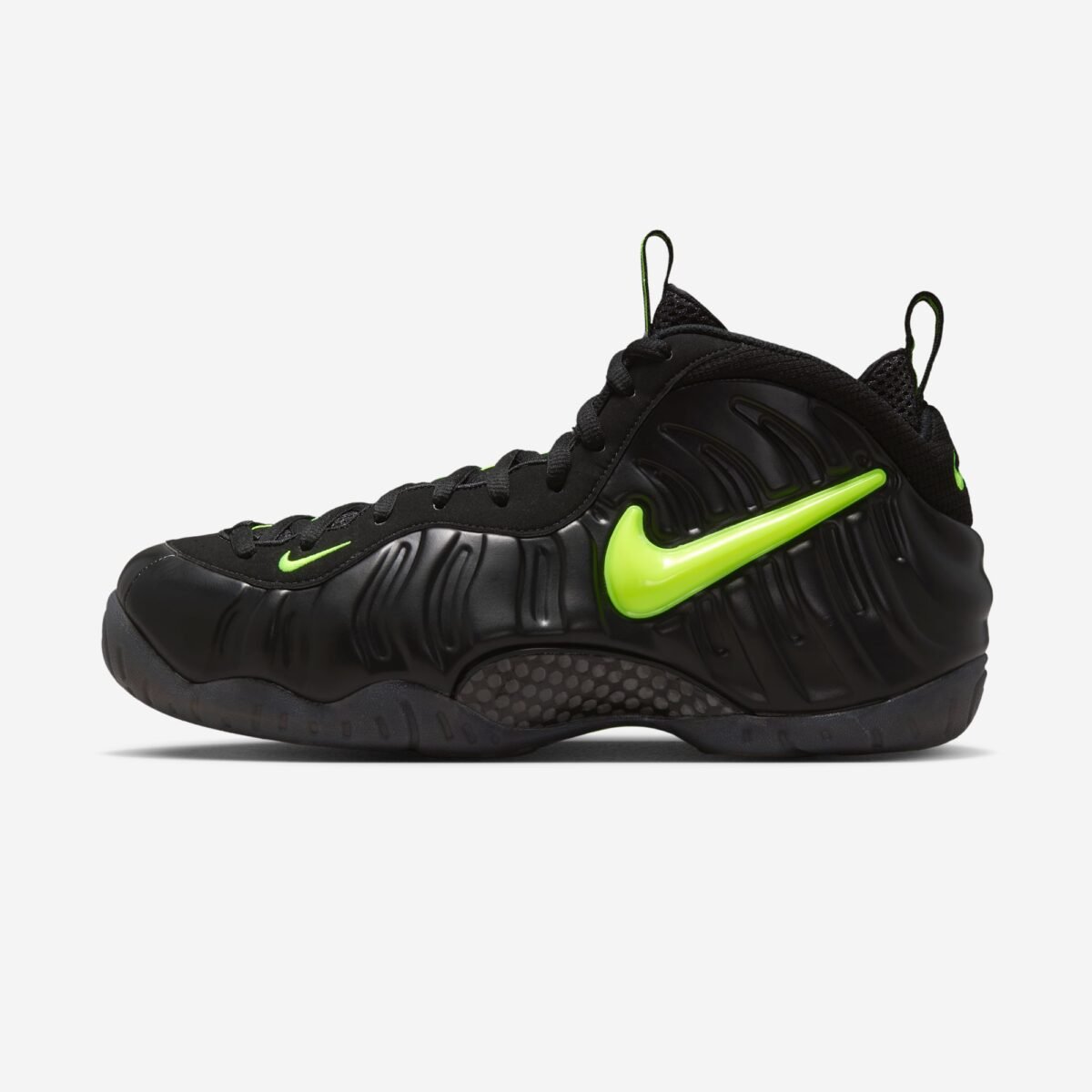 Nike Air Foamposite One Voltage colorway showcasing the signature monoblock foam shell construction - detail view 2