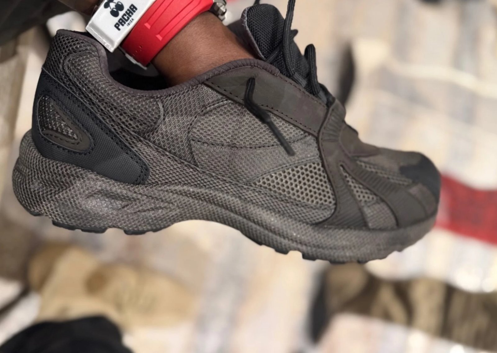 Yeezy 800 sneaker preview featuring fang toe-cap, layered panels, and ghillie lacing system - detail view 1