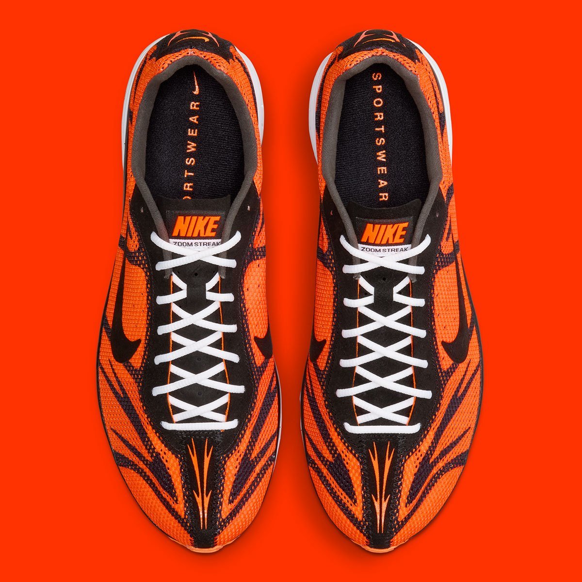 Nike Zoom Streak 3 in Safety Orange colorway with black stripes and white accents on laces and sole - detail view 3