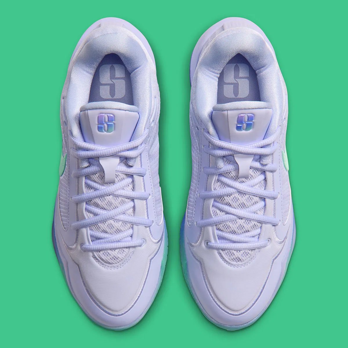 Nike Sabrina 4 Superstition colorway featuring pale purple upper with tri-tone gradient of Liberty green, royal blue, and metallic purple on the outsole and Swoosh - detail view 3