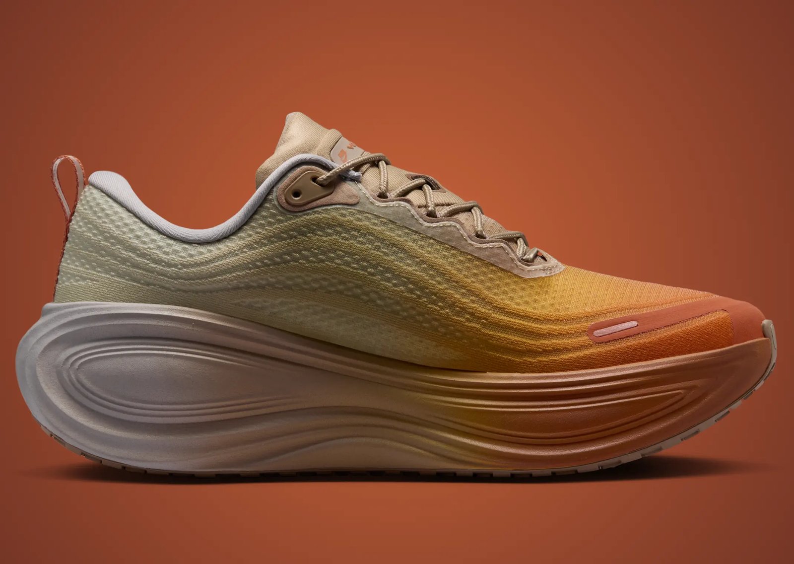 Nike Vomero Plus Cheat Day showing orange-to-grey gradient with Cheeto-inspired insole graphics - detail view 4
