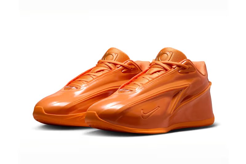 Nike KD 19 Orange Crush colorway featuring bright ceramic orange with stadium green and university gold accents - detail view 4