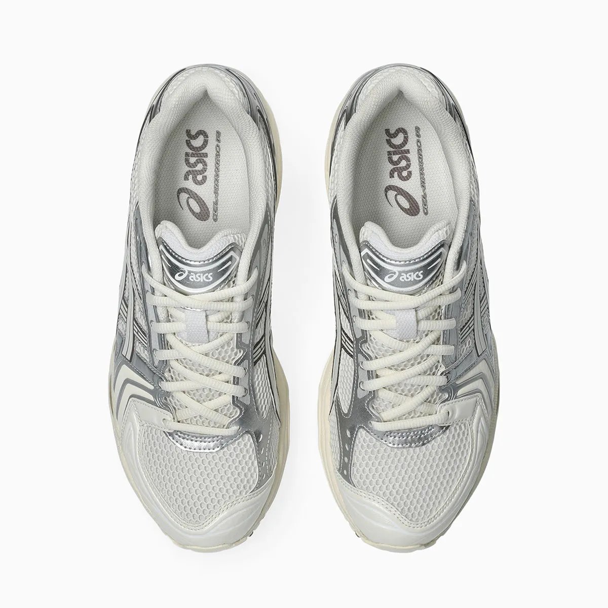 ASICS GEL-Kayano 14 in Cream and Cocoa Powder colorway, showcasing off-white mesh upper with metallic silver side panels and brushed cocoa heel detailing - detail view 3