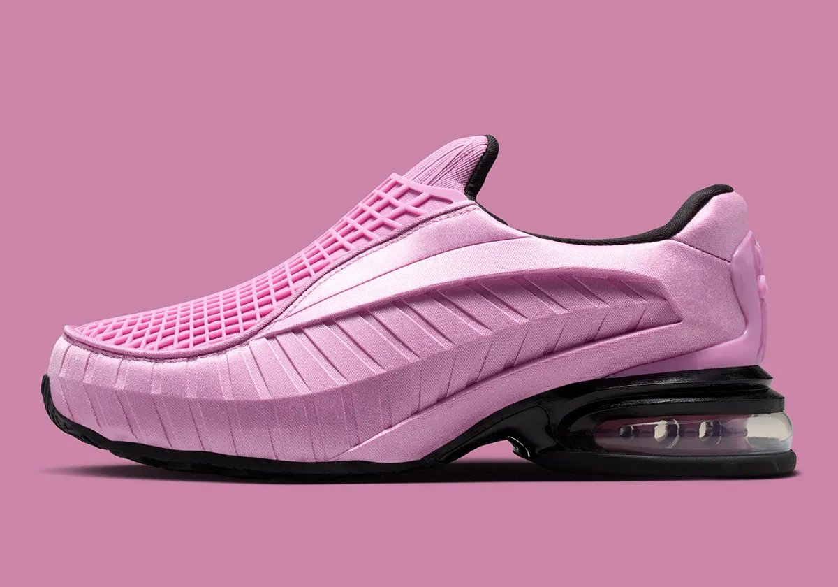 Nike Air Max Dolce Light Magenta colorway featuring gridded tongue cage, notched side panels, and translucent Air bubble sole - detail view 1
